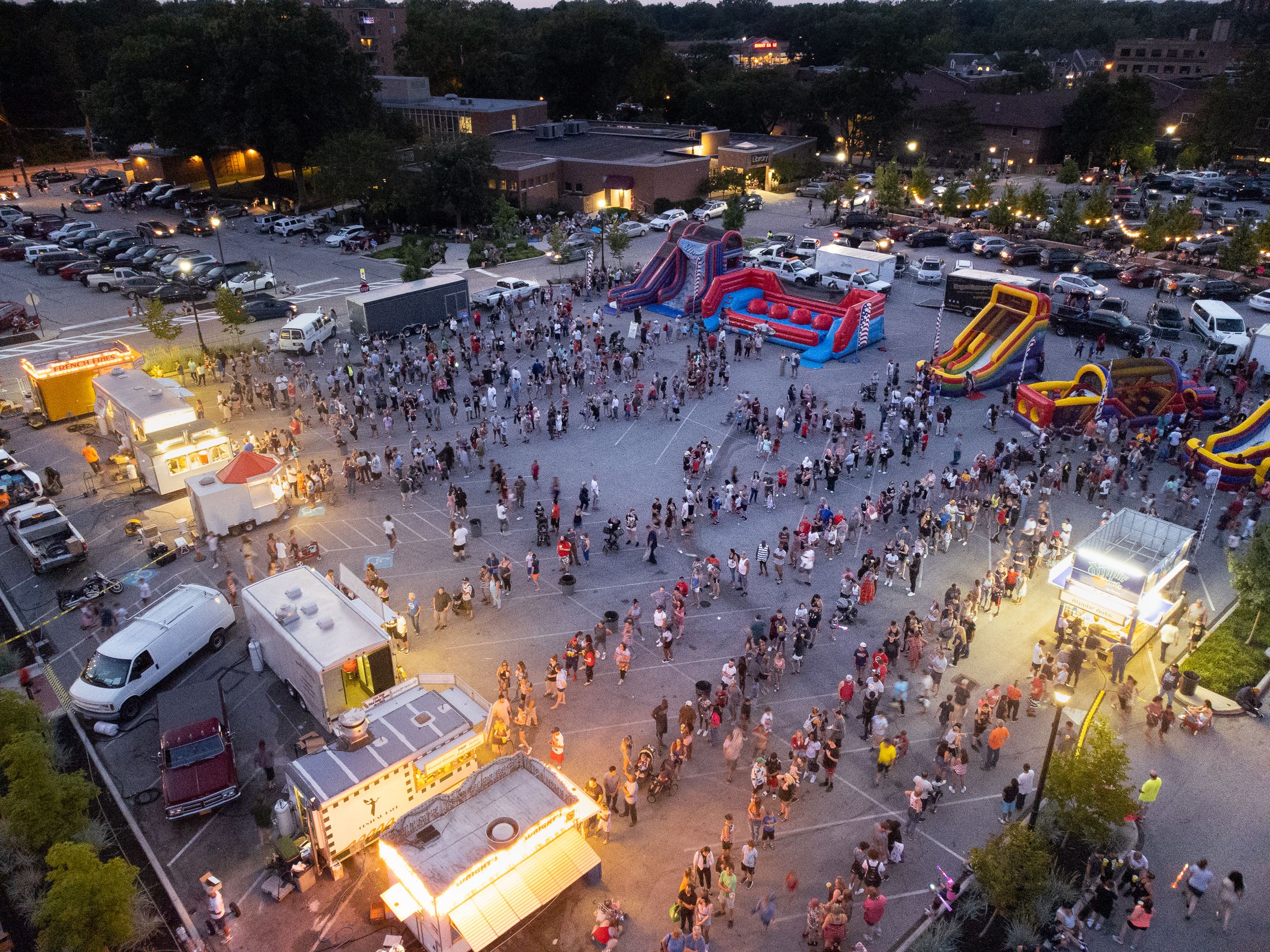 Drone view photo of Coe Lake Park with crowds